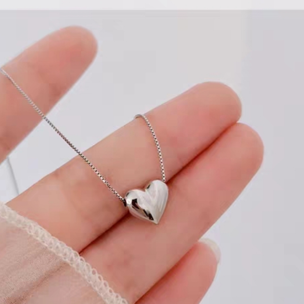 Silver Necklace with a heart pendant
